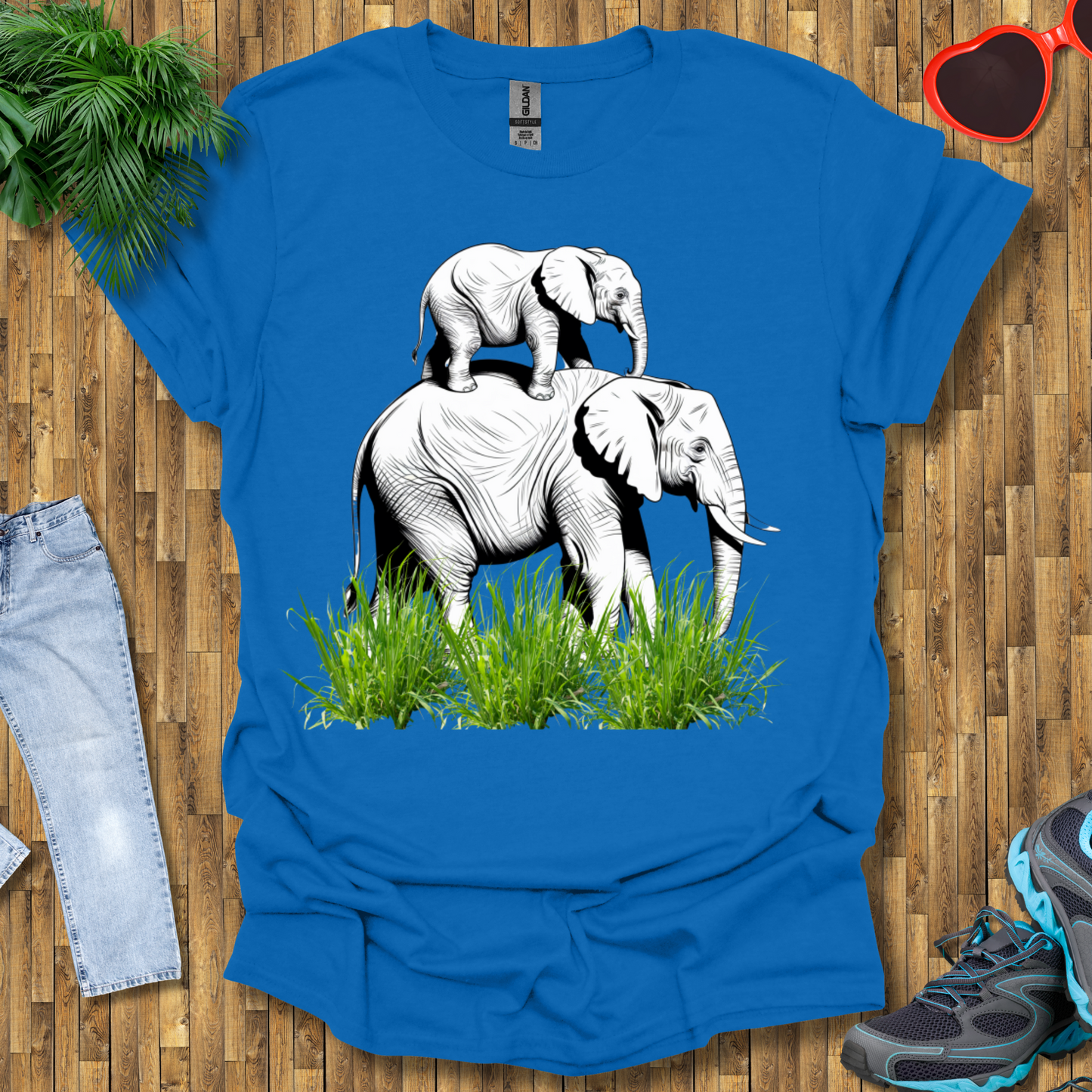 Mother elephant carrying baby elephant T-Shirt