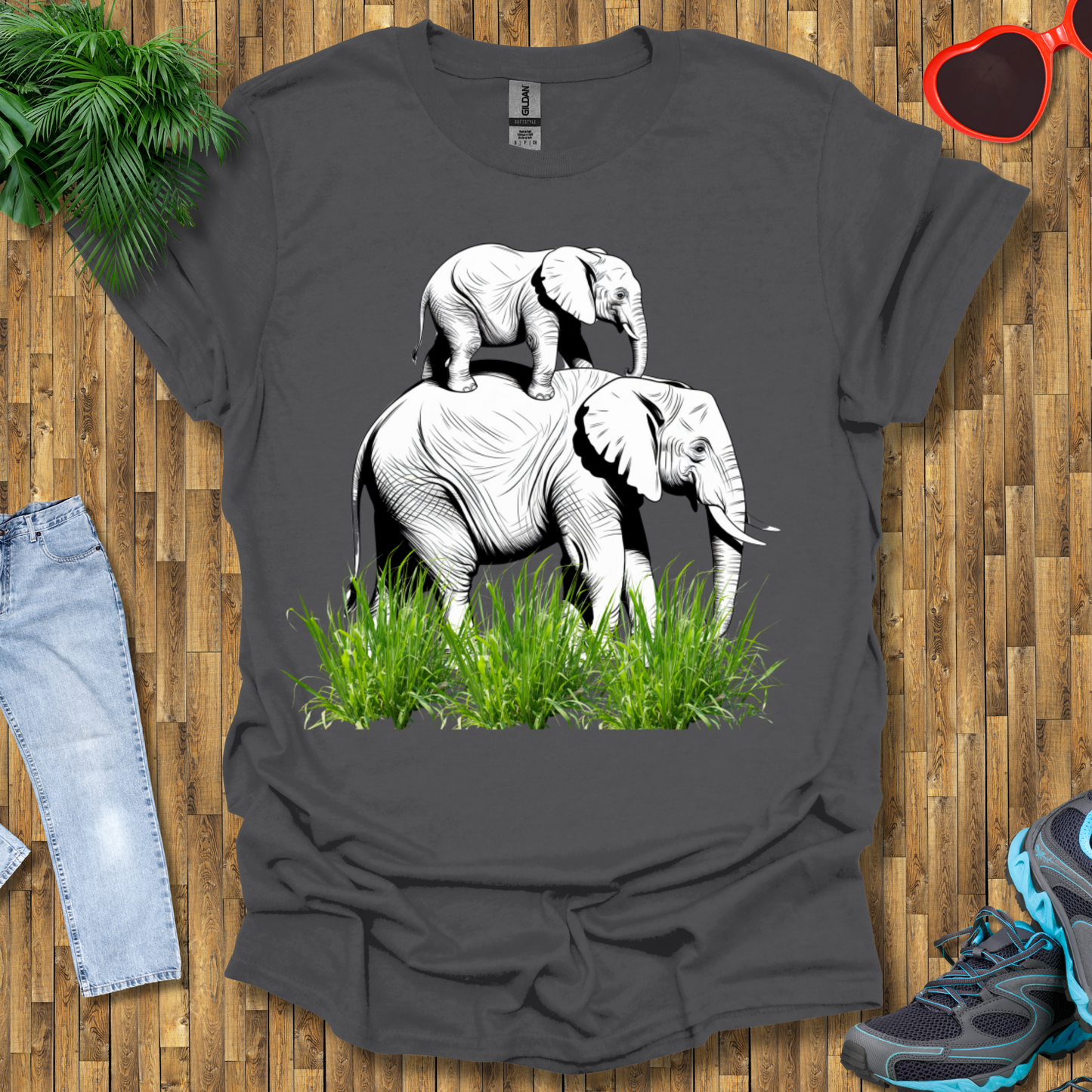 Mother elephant carrying baby elephant T-Shirt