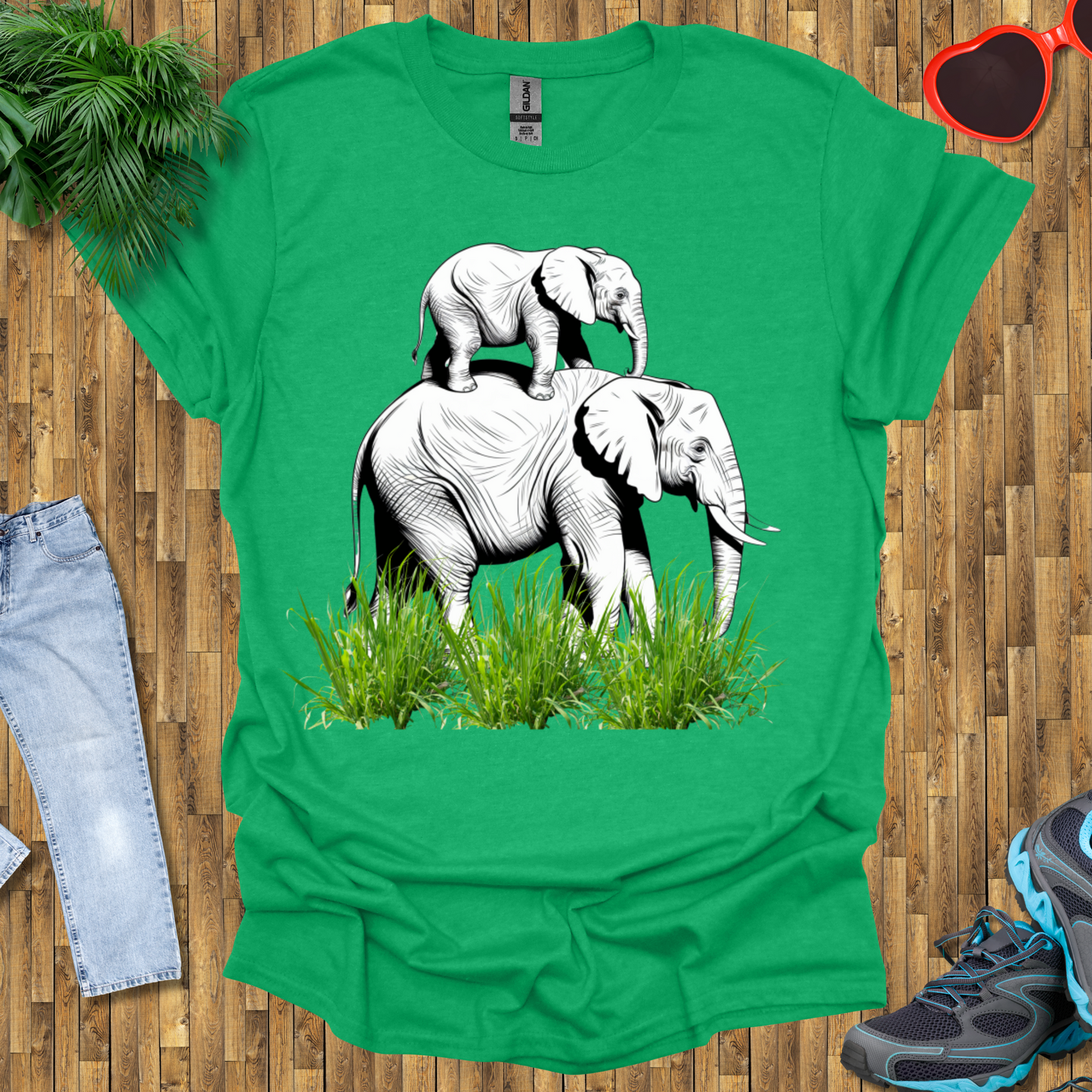 Mother elephant carrying baby elephant T-Shirt
