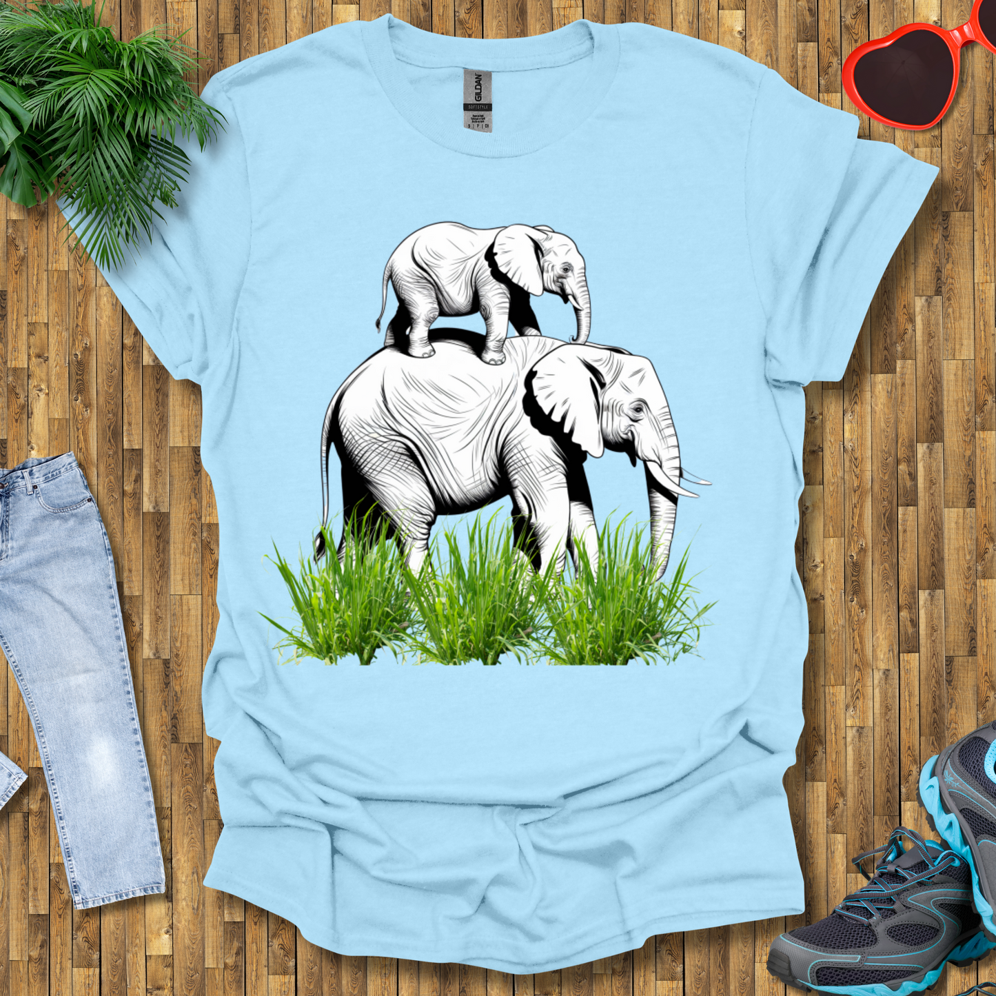 Mother elephant carrying baby elephant T-Shirt