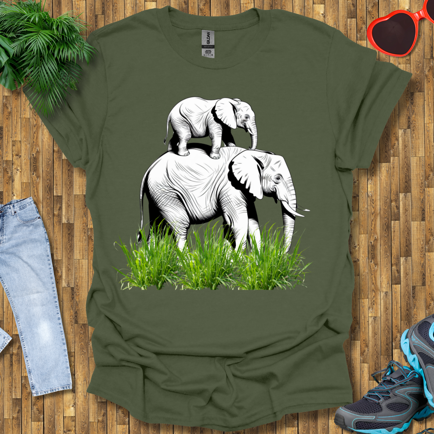 Mother elephant carrying baby elephant T-Shirt
