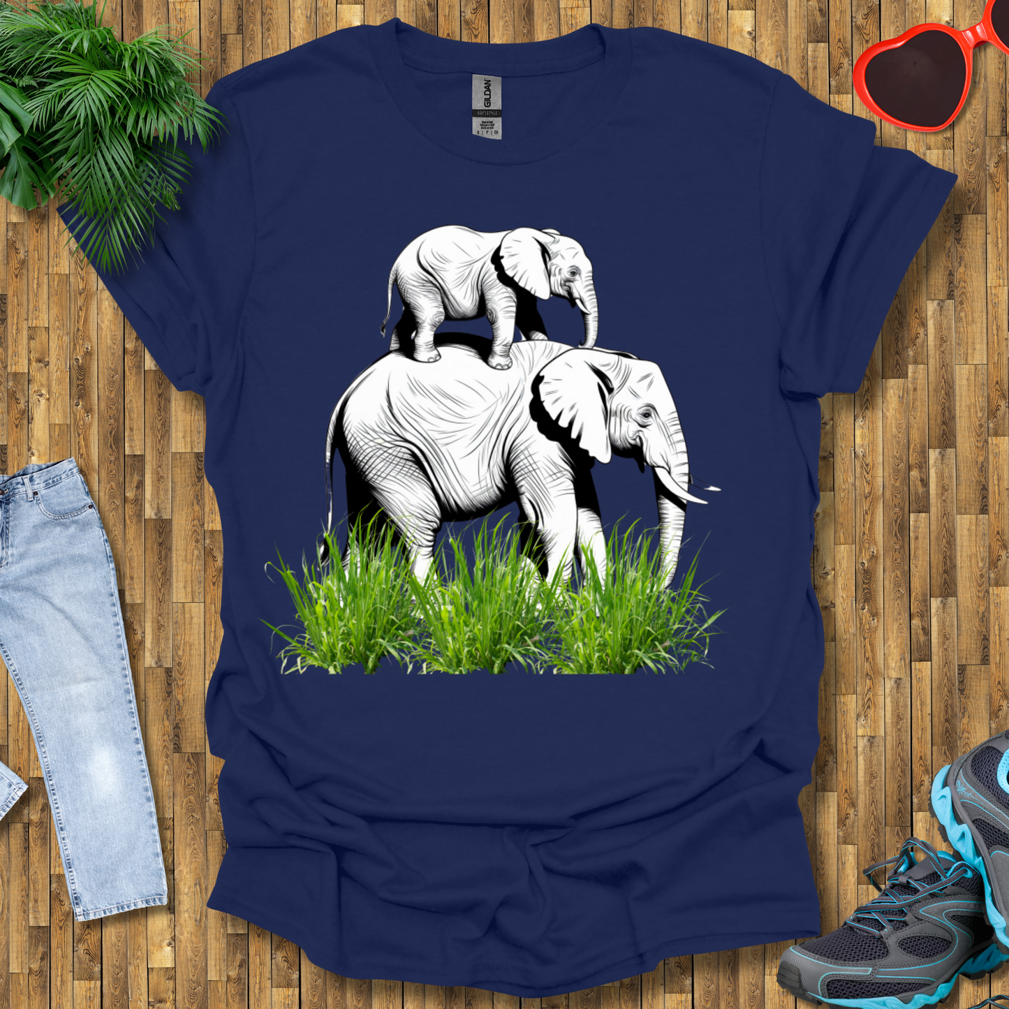 Mother elephant carrying baby elephant T-Shirt