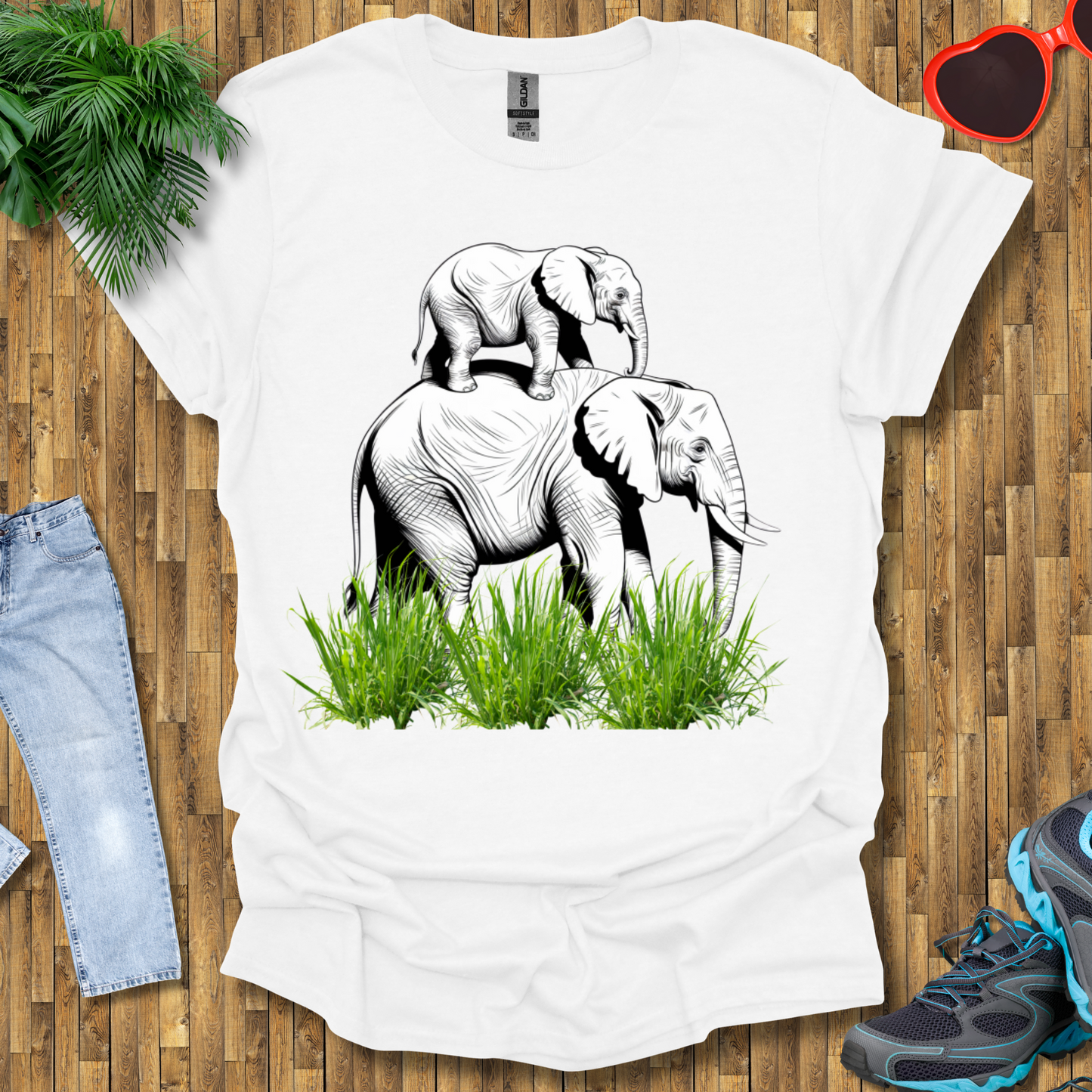 Mother elephant carrying baby elephant T-Shirt