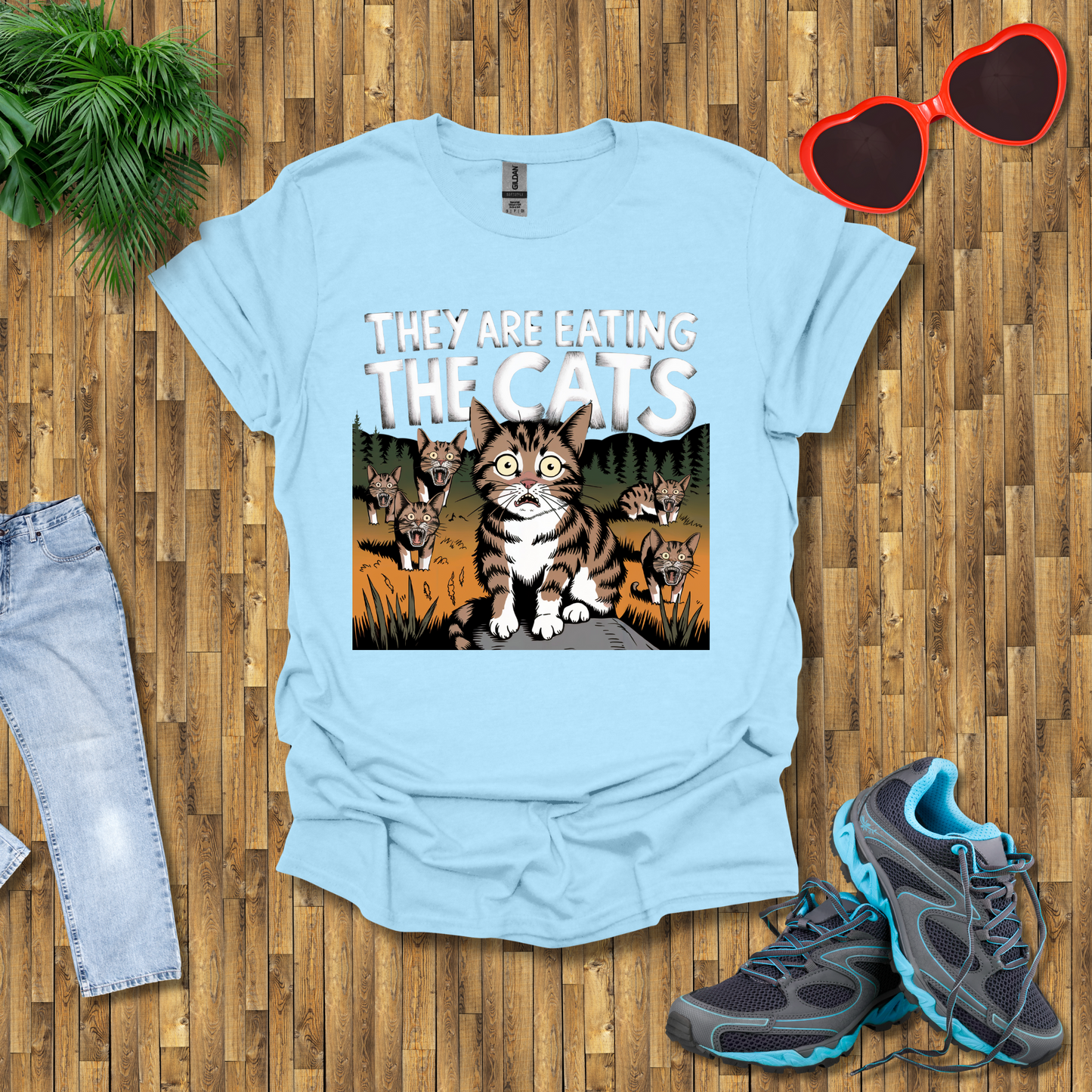 They are eating the cats  T-Shirt