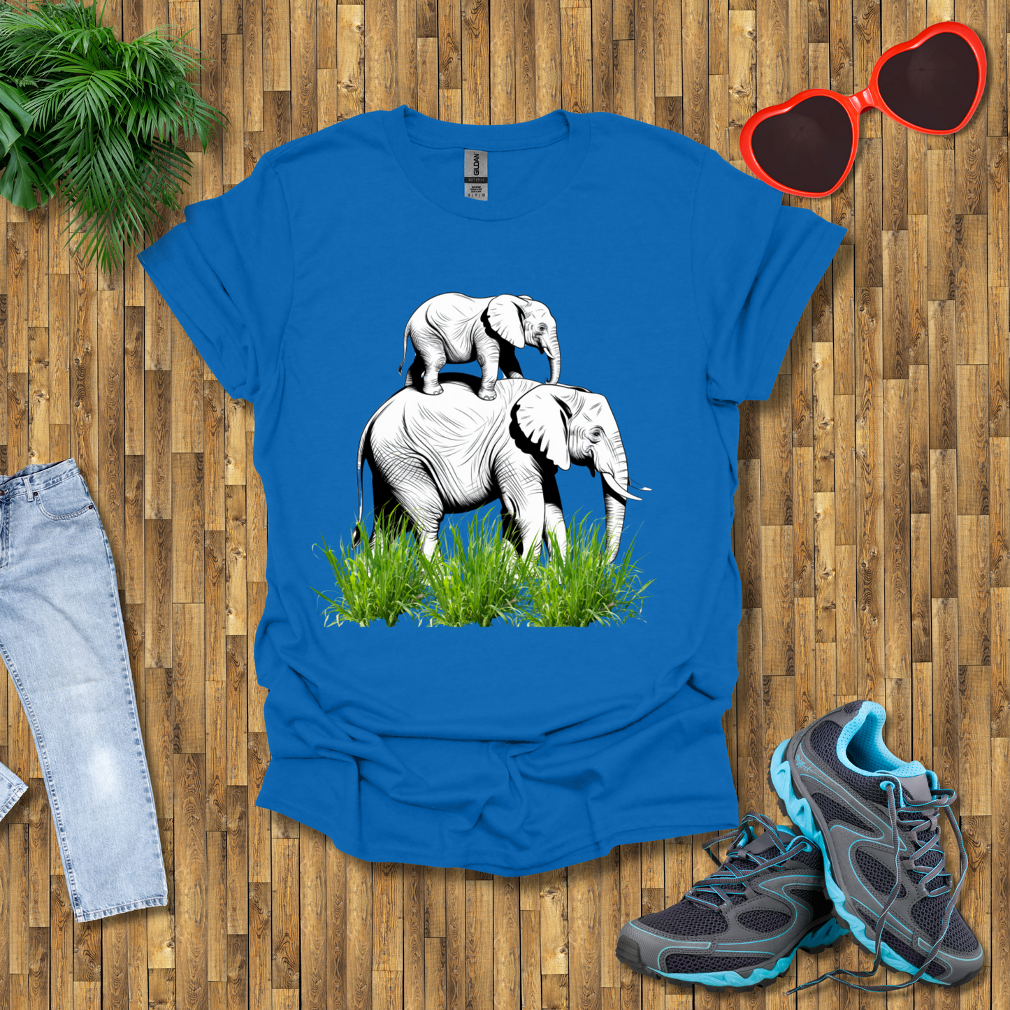 Mother elephant carrying baby elephant T-Shirt