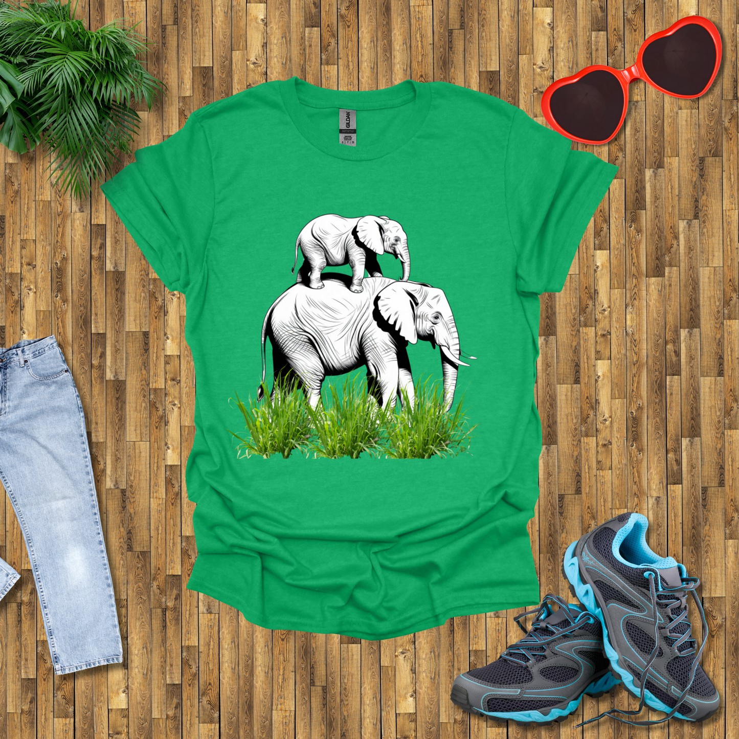 Mother elephant carrying baby elephant T-Shirt