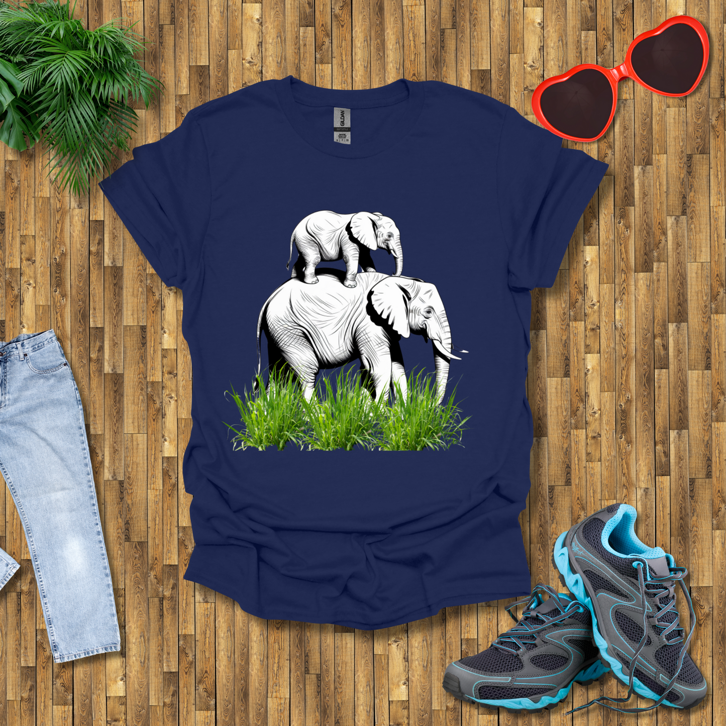 Mother elephant carrying baby elephant T-Shirt